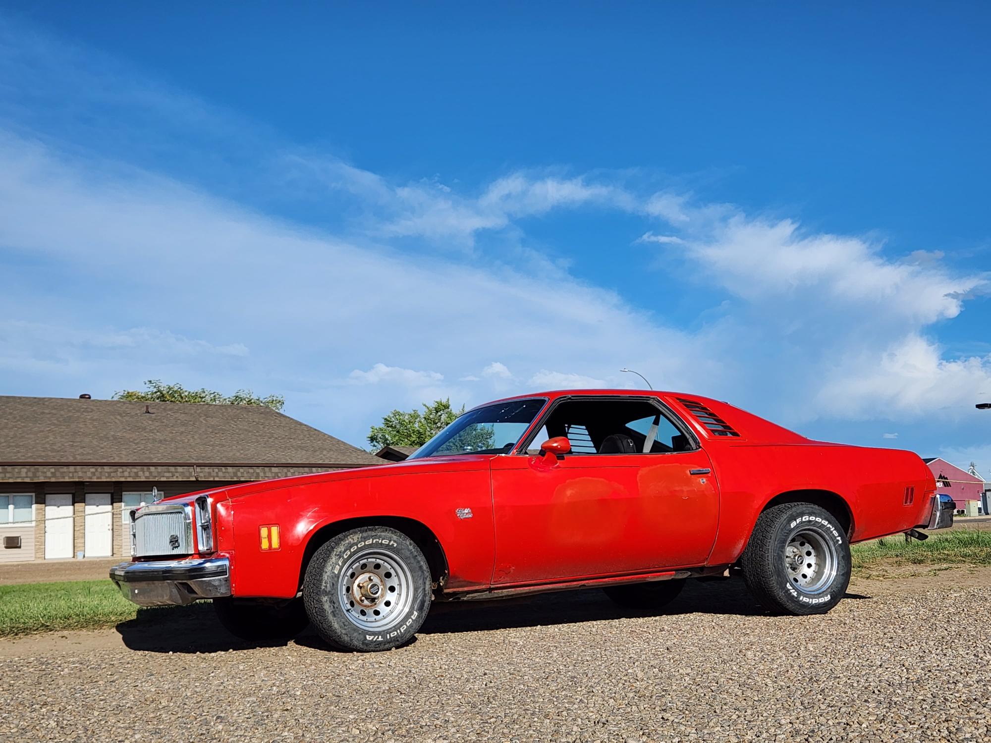 Chrome, cream, and a valve cover racing scene in Shaunavon